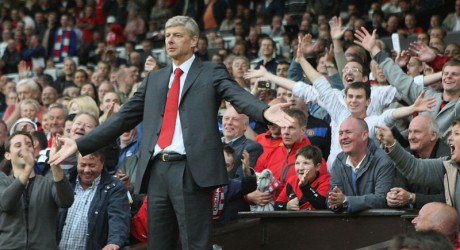 Fans jeer Arsene Wenger in happier times, as in not Arsenal fans and not at the home stadium.